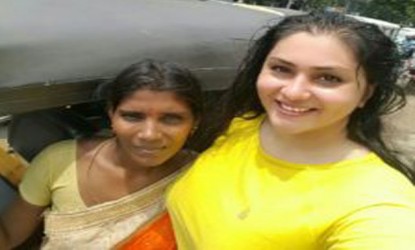 Namitha's seeks selfie with a lady